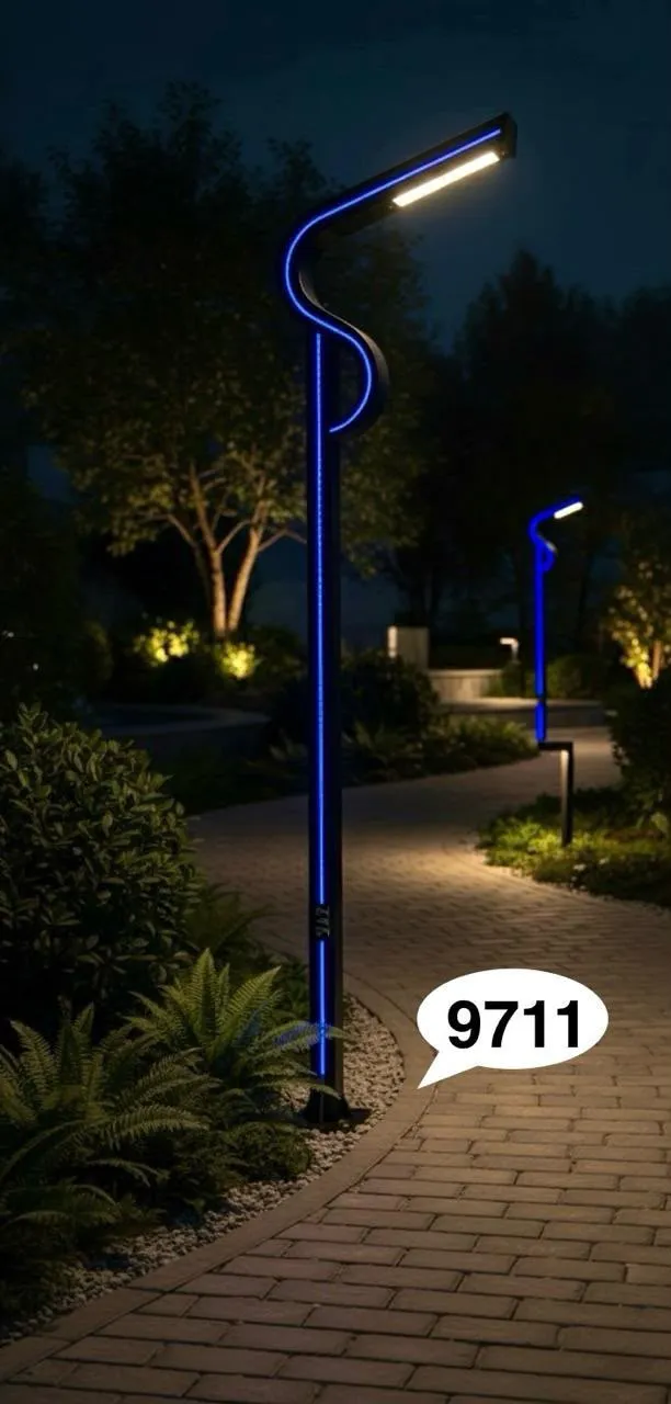 Garden Light 9711 beside a garden path at night
